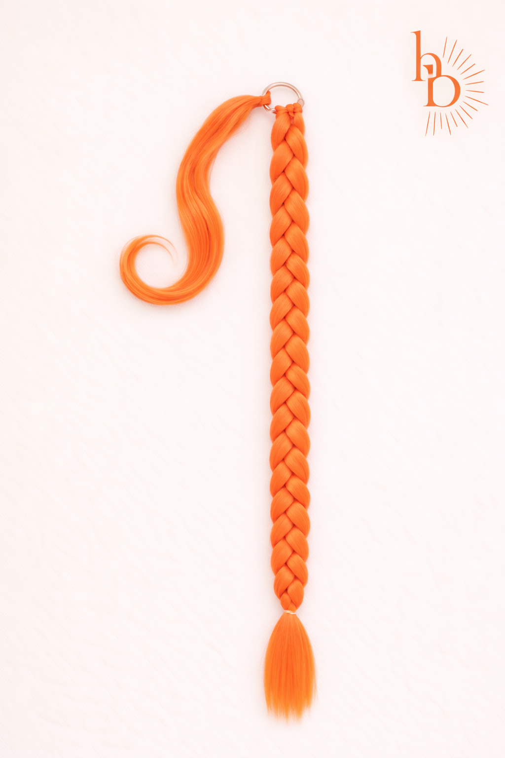 Premium vlechtstaart oranje 70cm braid ponytail Koningsdag - De HaarBoetiek
