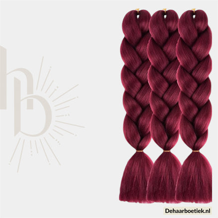 De haarboetiek invlecht haar bundel rood 