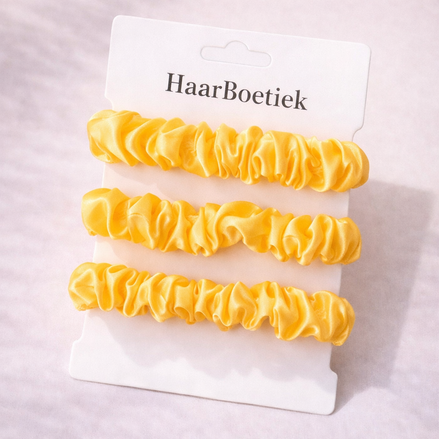 Haar scrunchies geel satijn - De HaarBoetiek