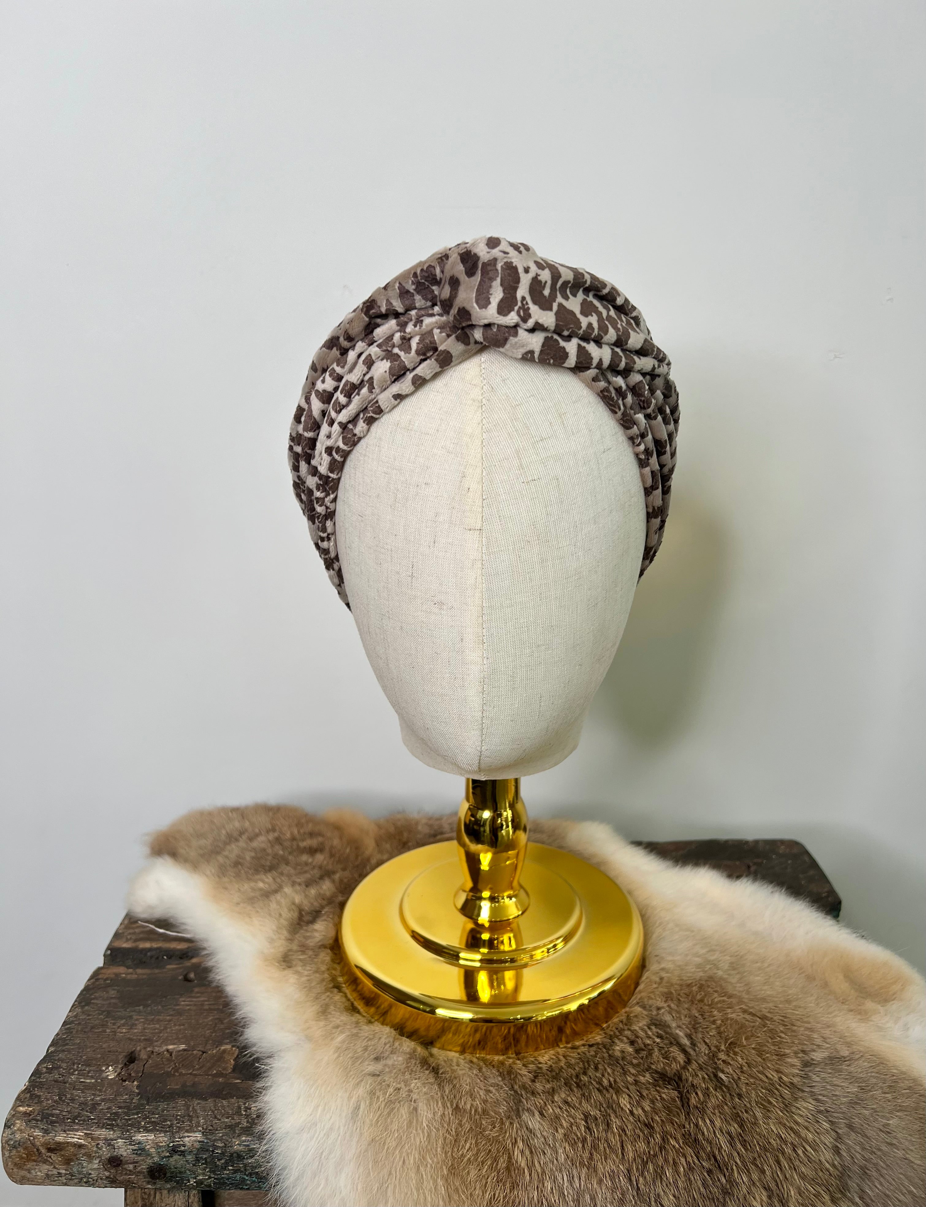 Katoenen bandeau haarband met zandkleurige luipaardprint