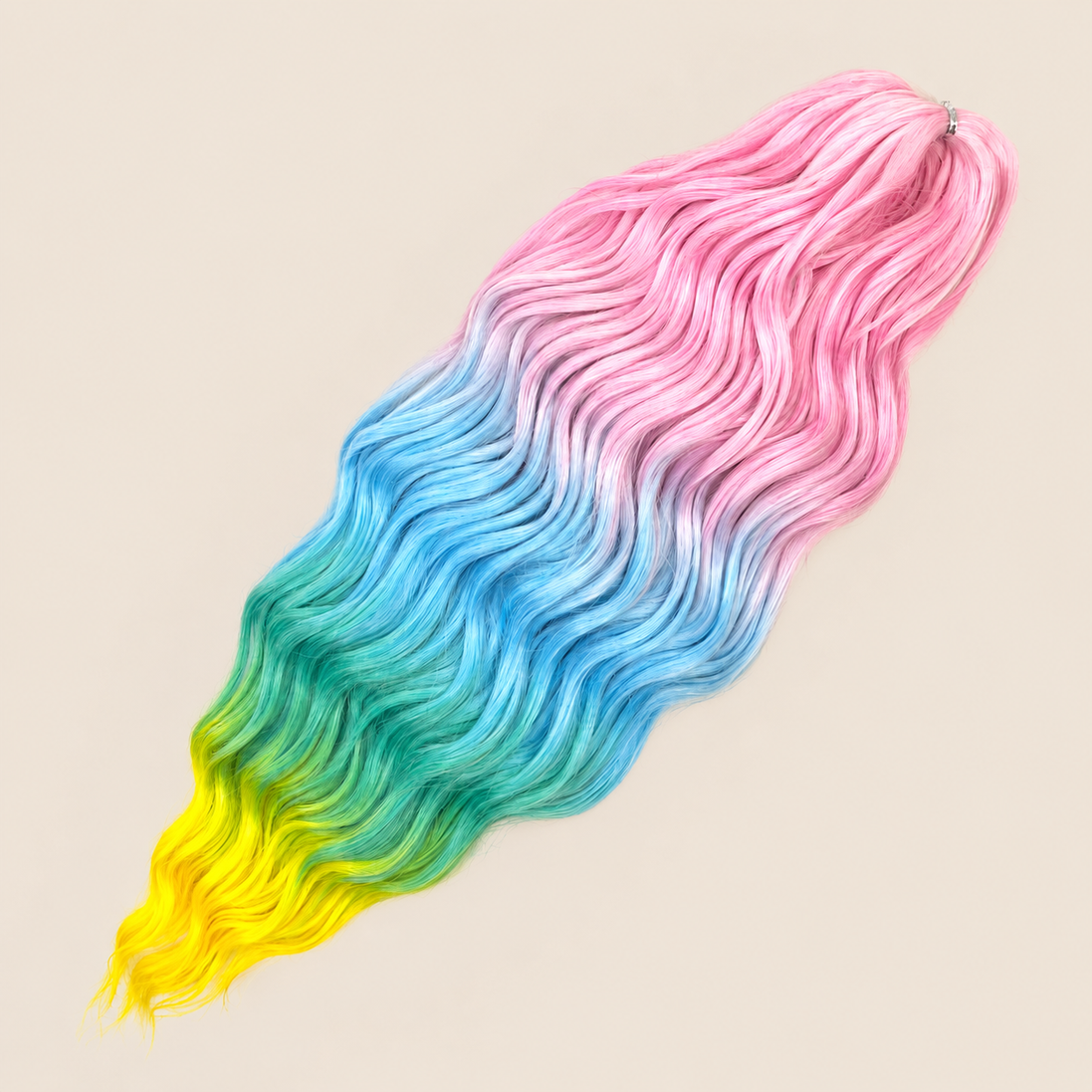 Anna golvend kanekalon invlechthaar roze-blauw-groen-geel ombre HPD136, 60 cm en 100 gram op beige achtergrond
