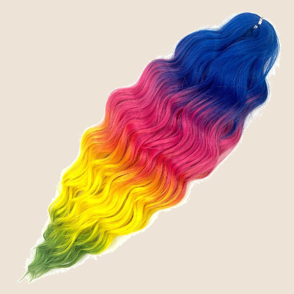 Anna golvend invlechthaar 60 cm 100 g – Blauw-roze-geel-groen ombre (4TW-BPYG) – De HaarBoetiek