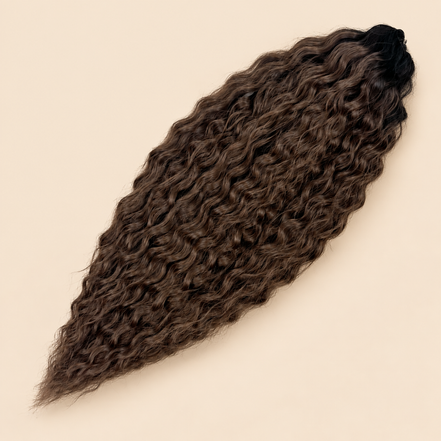 Ariel golvend kanekalon invlechthaar 55 cm 300 g in zwart/bruin ombre (kleur TT1B/DBROWN16) op beige achtergrond