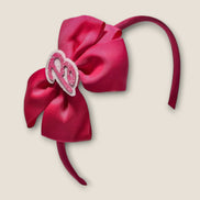 Barbie haarband donkerroze met grote strik