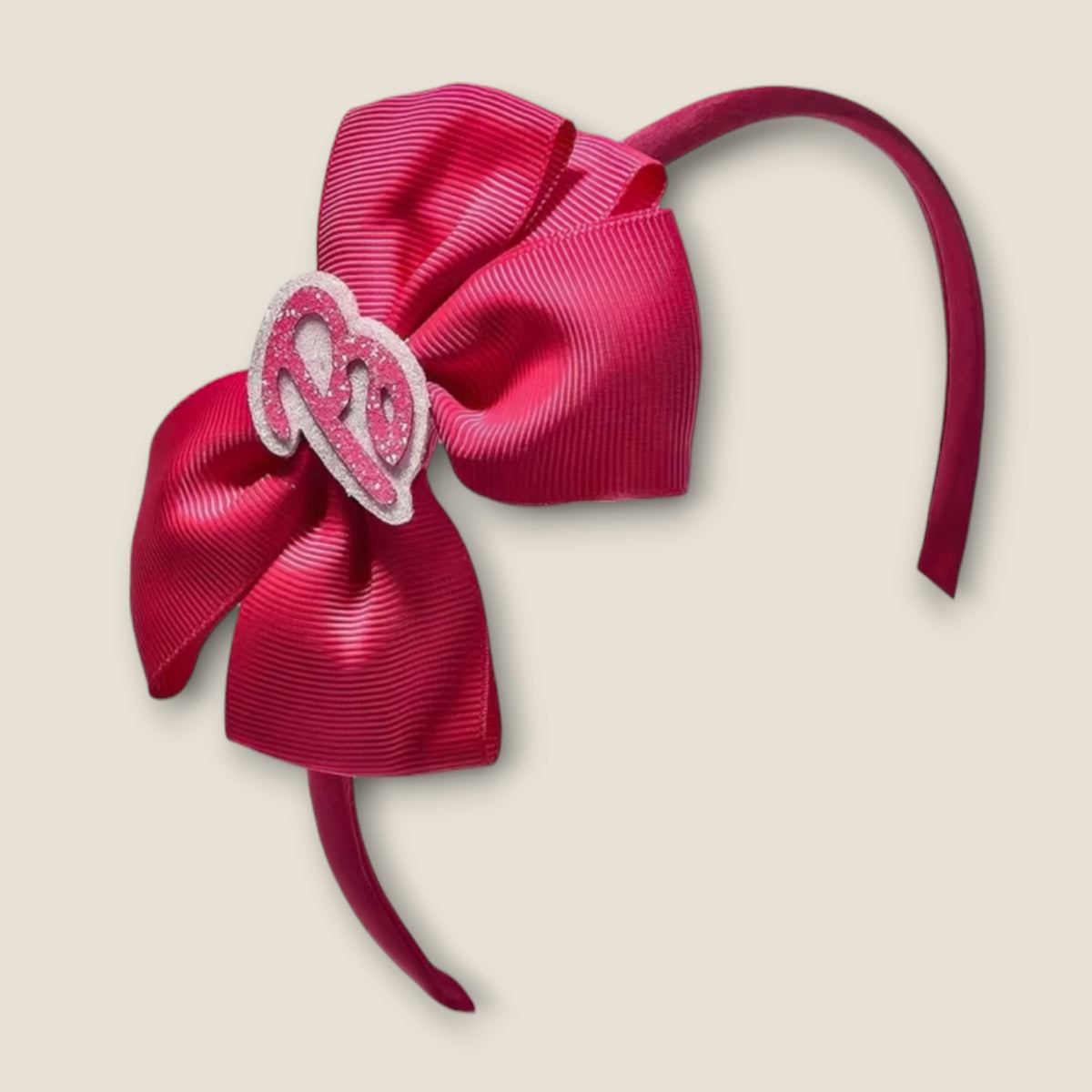 Barbie haarband donkerroze met grote strik