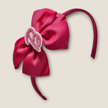 Barbie haarband donkerroze met grote strik