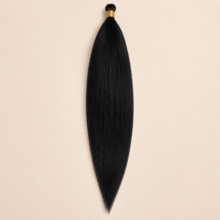 Steil Futura Kanekalon vlechthaar in kleur Black, 70 cm en 100 gram, op beige achtergrond