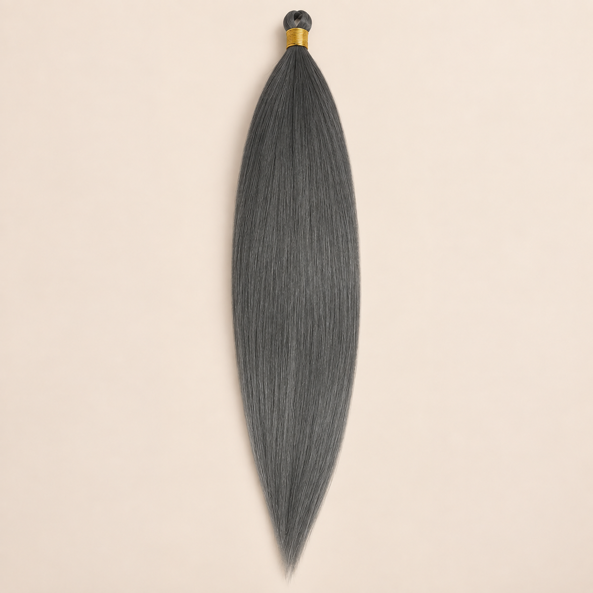 Steil Futura Kanekalon vlechthaar in kleur Graphite, 70 cm en 100 gram, op beige achtergrond
