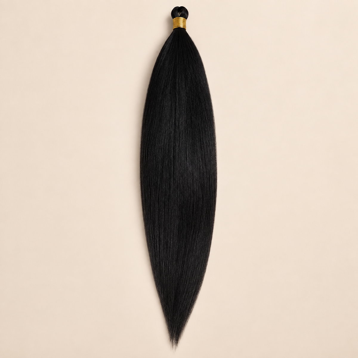 Steil Futura Kanekalon vlechthaar in kleur Natural Black, 70 cm en 100 gram, op beige achtergrond