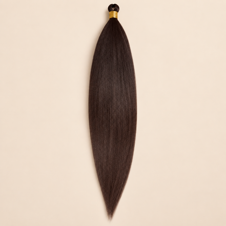 Steil Futura Kanekalon vlechthaar in kleur Onyx, 70 cm en 100 gram, op beige achtergrond