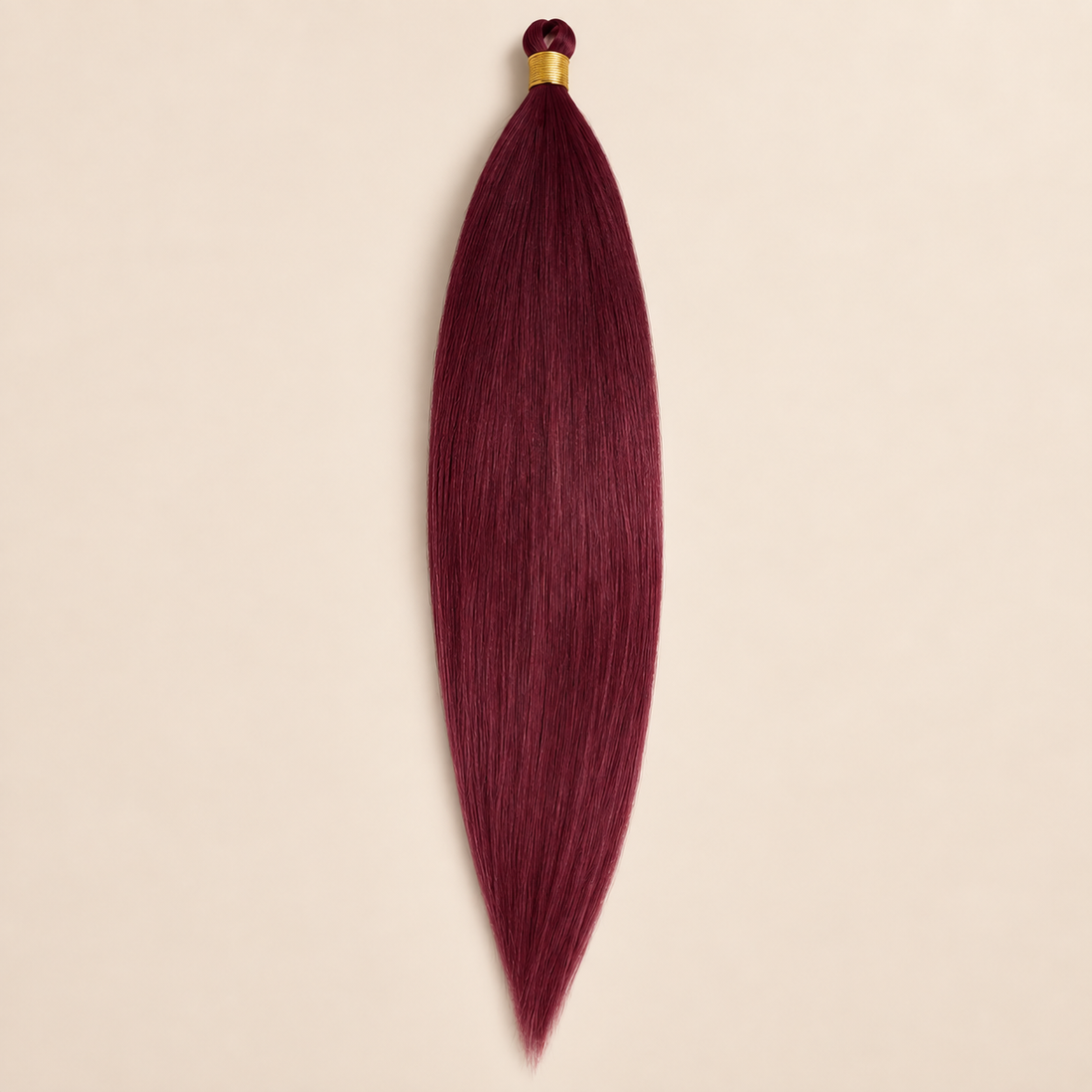 Steil Futura Kanekalon vlechthaar in kleur Vamp Berry, 70 cm en 100 gram, op beige achtergrond