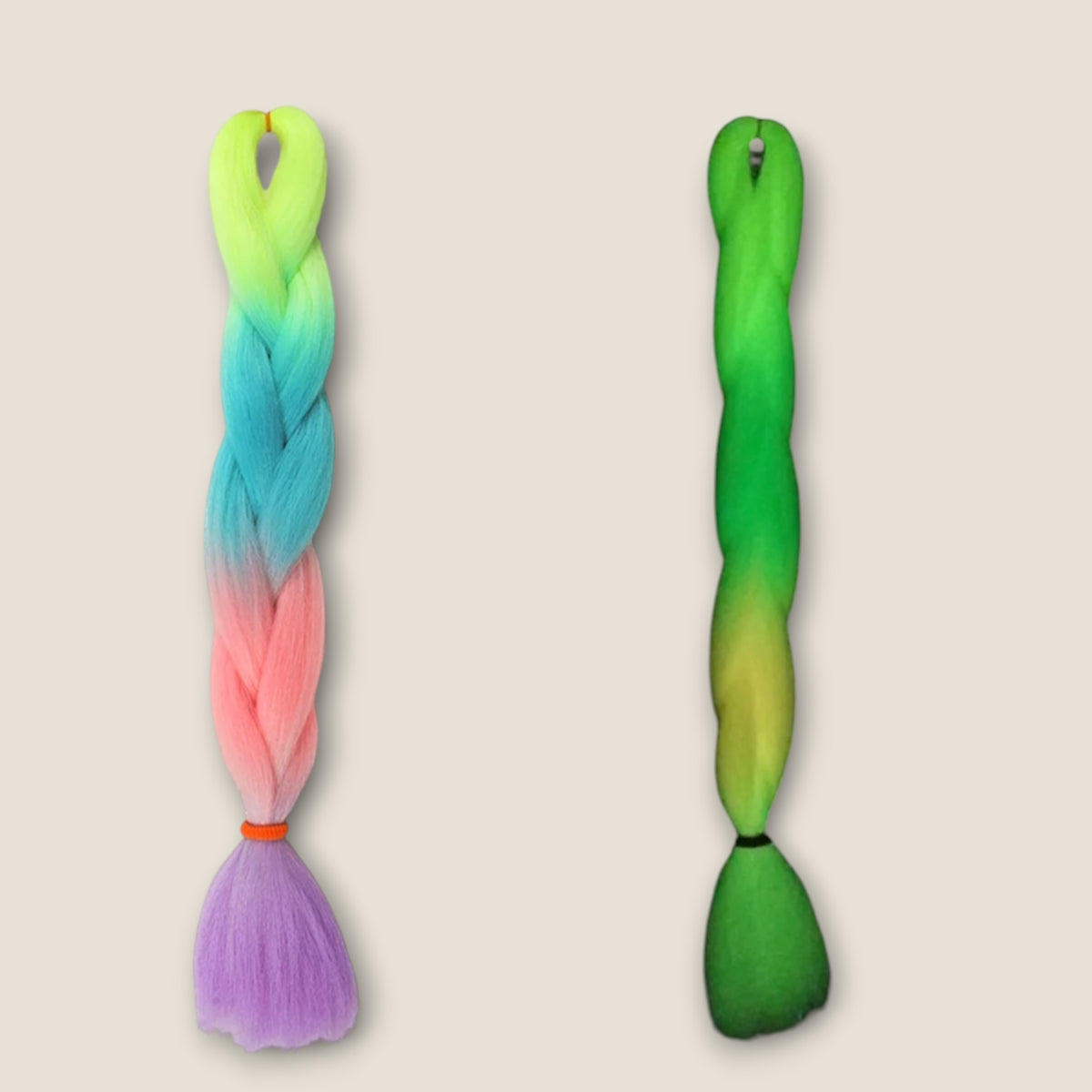 Glow in the Dark invlechthaar neon geel aqua roze lila met glow effect op beige achtergrond