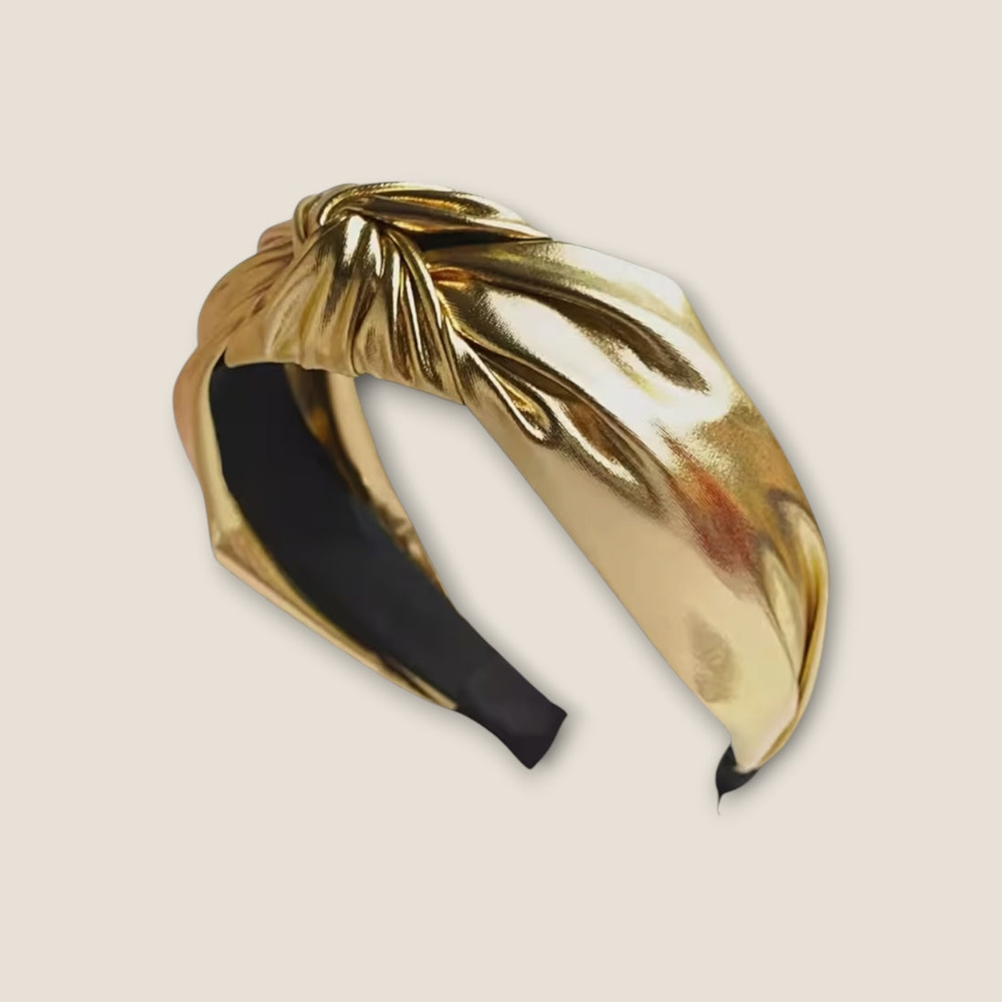 Haarband Shine Goud metallic haarband op beige achtergrond
