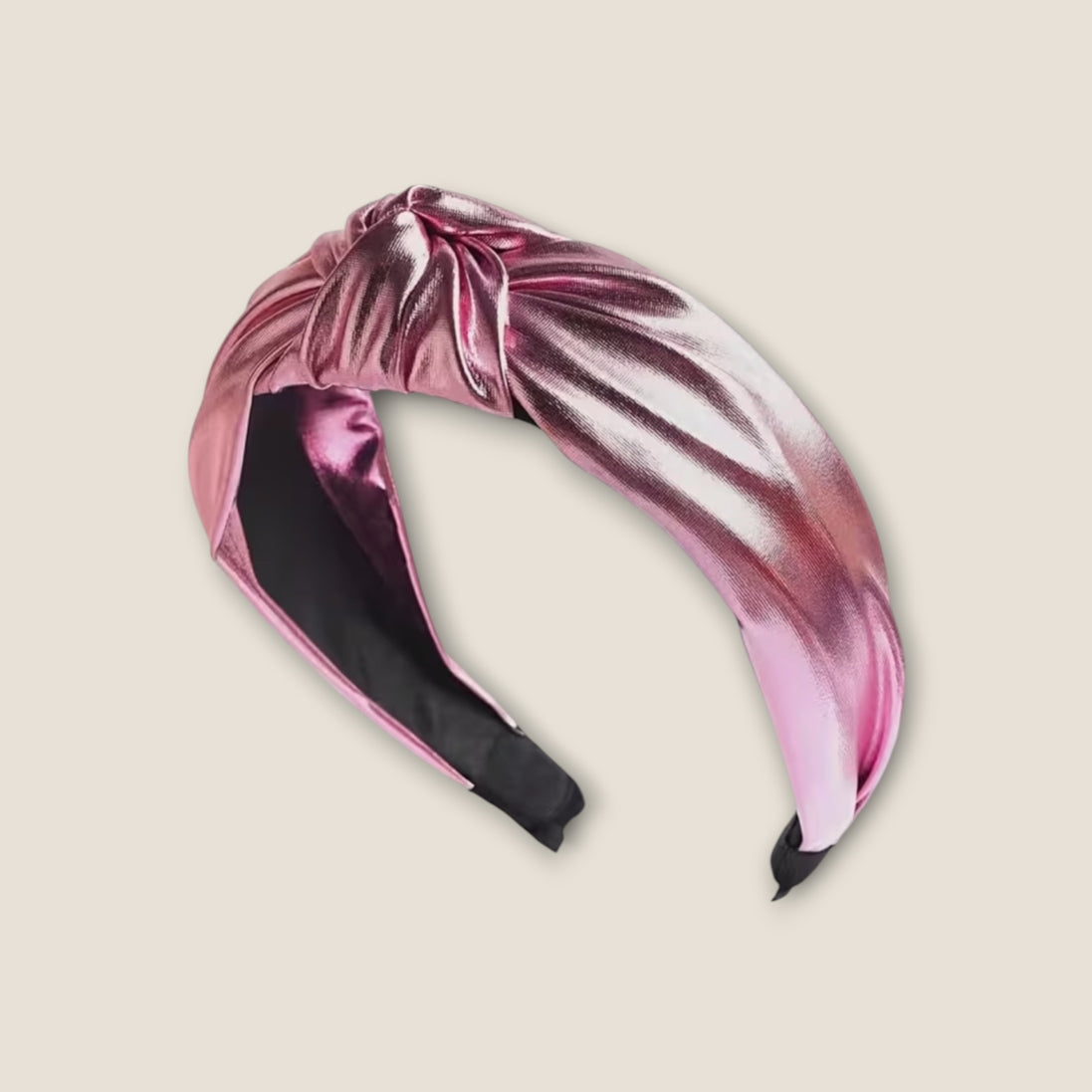 Haarband Shine Roze metallic haarband op beige achtergrond