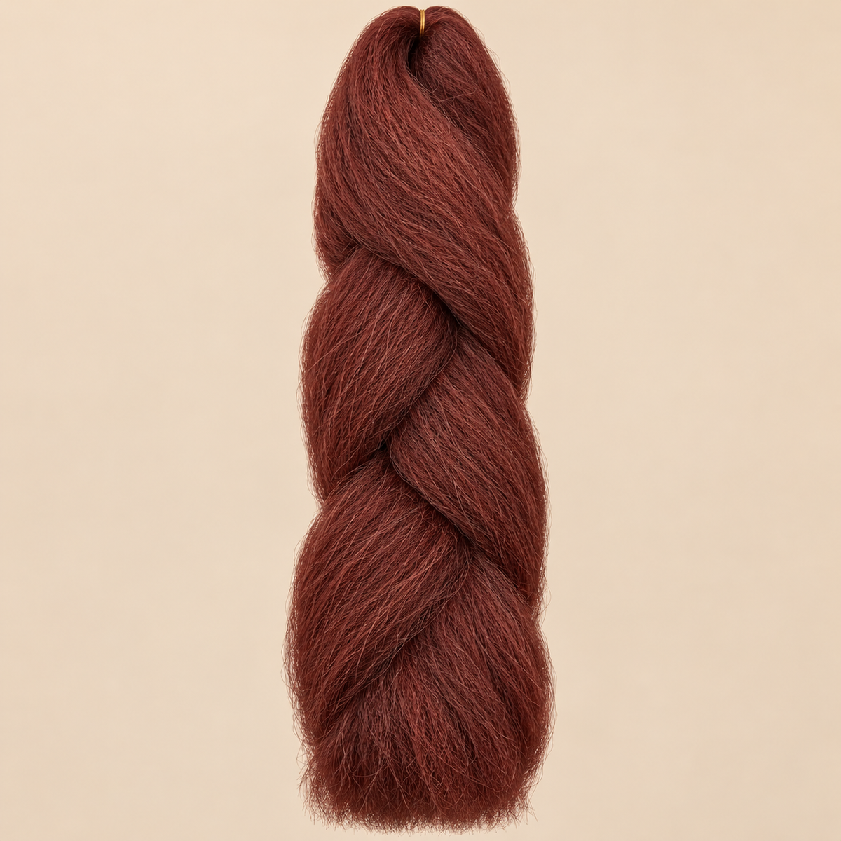Jumbo Braid 100% Kanekalon Bng kleur 350 koperrood, 60 cm, 85 gram op beige achtergrond