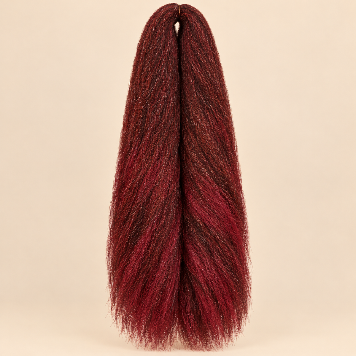 Jumbo Braid 100% Kanekalon SuperBraid kleur P35/39 rood gemêleerd, 60 cm, 85 gram op beige achtergrond