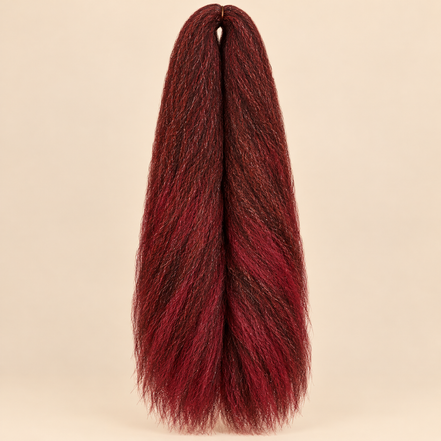 Jumbo Braid 100% Kanekalon SuperBraid kleur P35/39 rood gemêleerd, 60 cm, 85 gram op beige achtergrond