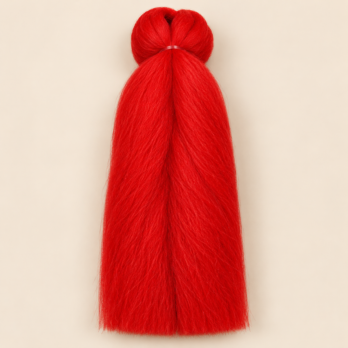 Jumbo Braid BraidOrDie 60 cm – Red helder rood op beige achtergrond