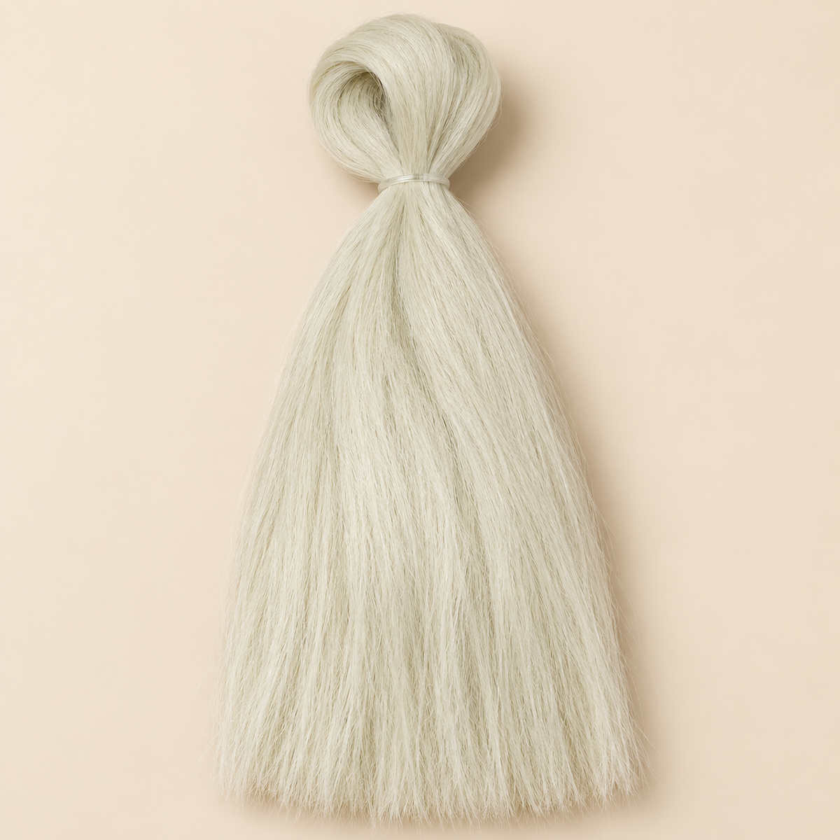 Jumbo Braid BraidOrDie 60 cm – Light Blonde lichtblond op beige achtergrond