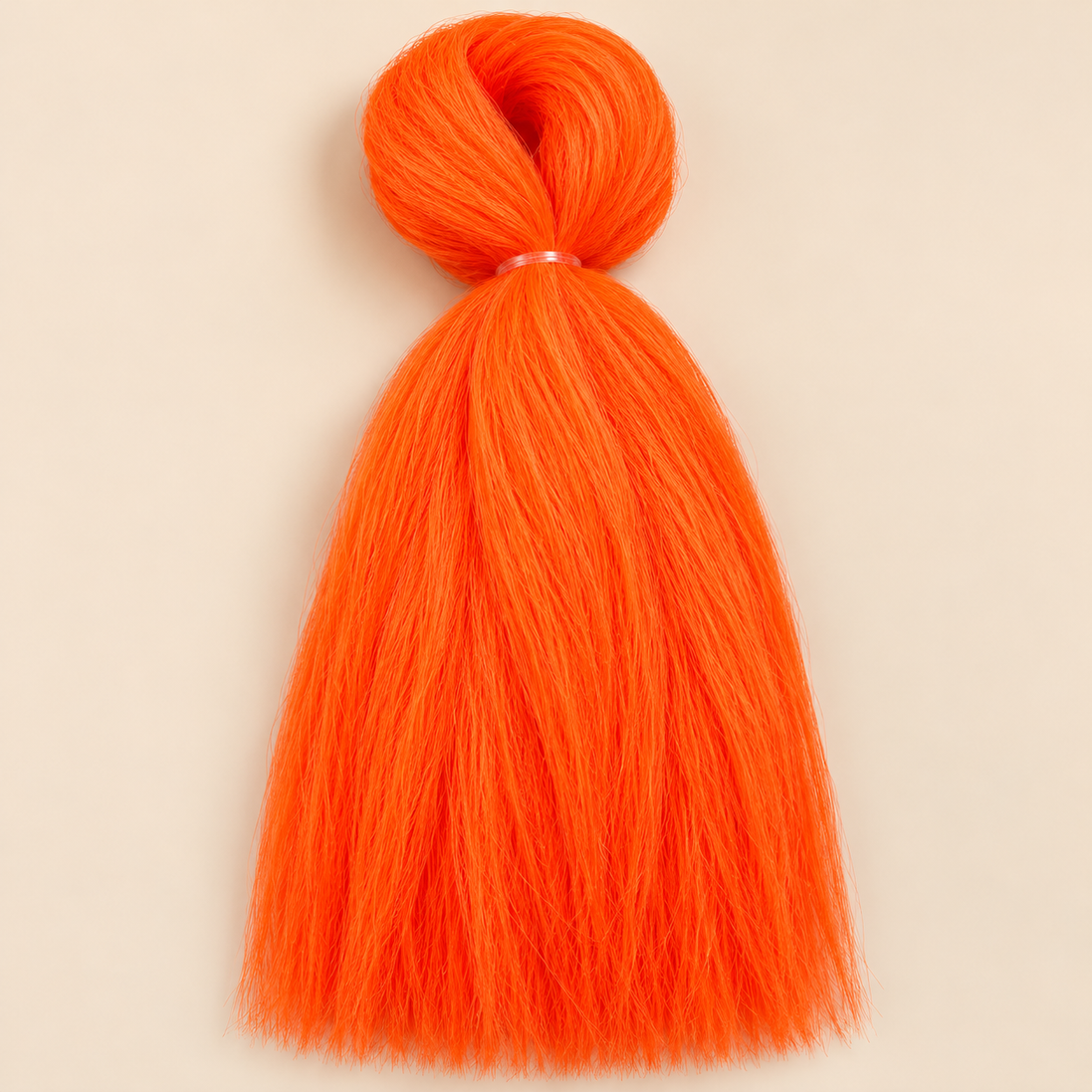 Jumbo Braid BraidOrDie 60 cm – Neon Orange neonoranje op beige achtergrond