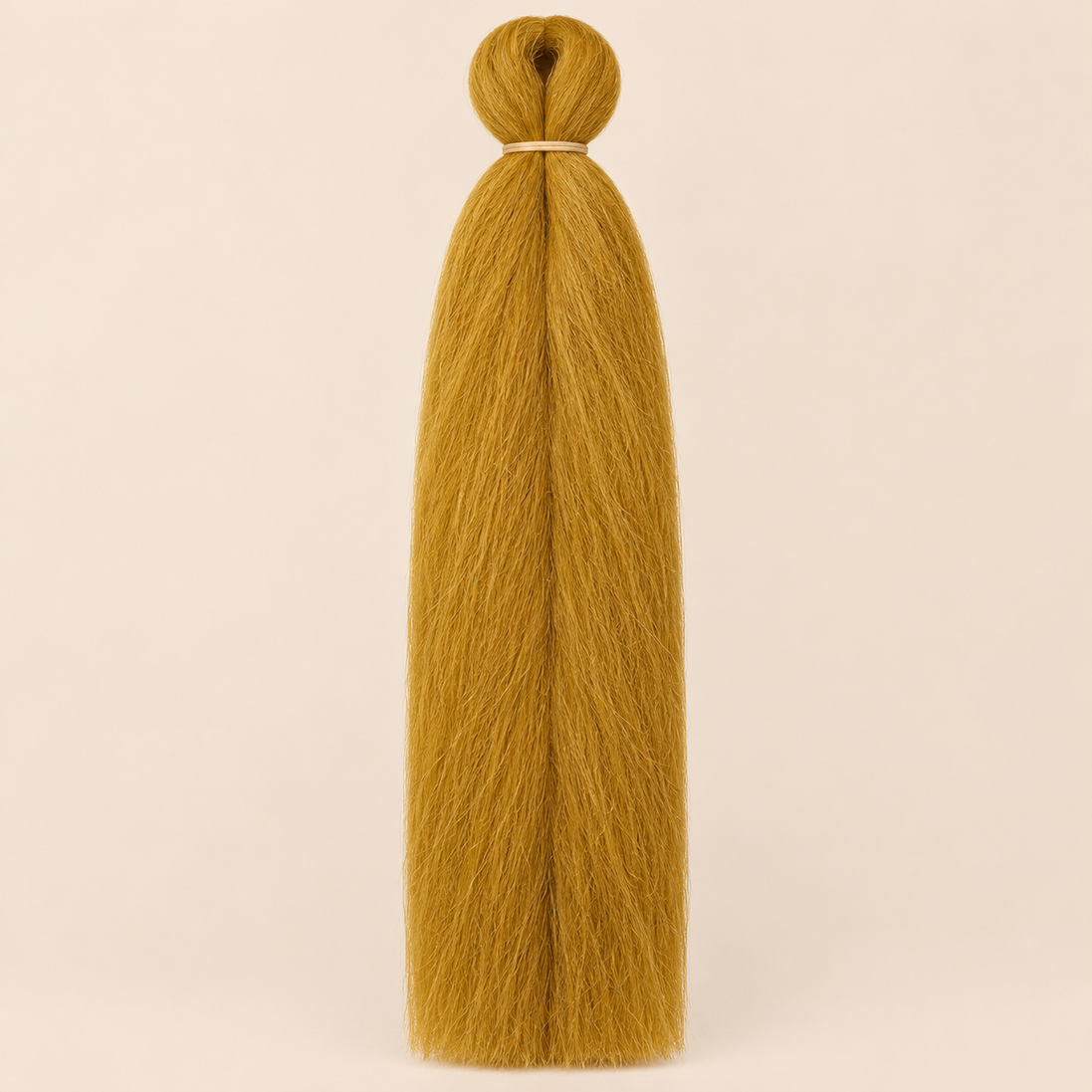 Jumbo Braid BraidOrDie 60 cm – Honey honingblond op beige achtergrond