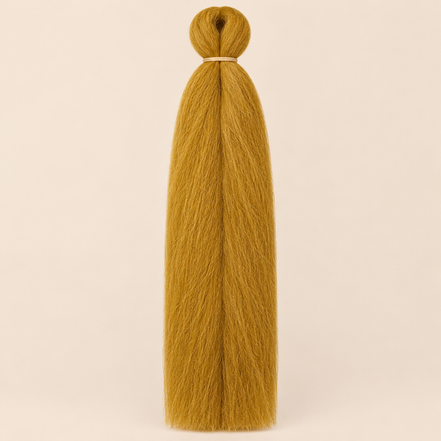 Jumbo Braid BraidOrDie 60 cm – Honey honingblond op beige achtergrond