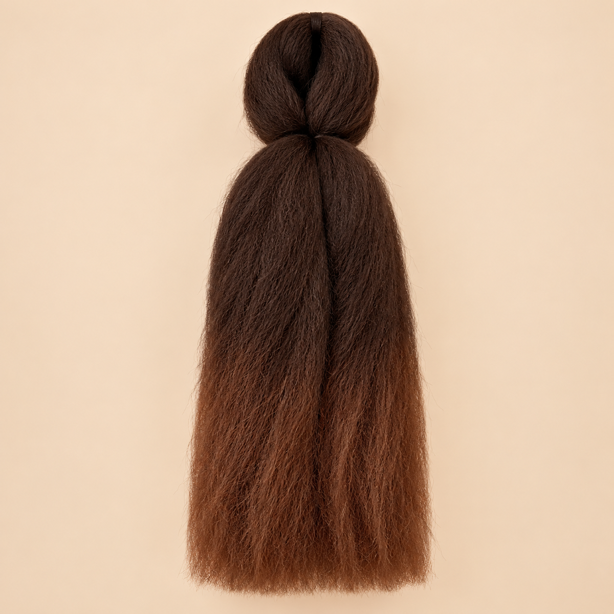 Jumbo Braid BraidOrDie 60 cm – T4/8 donkerbruin-warmbruin op beige achtergrond