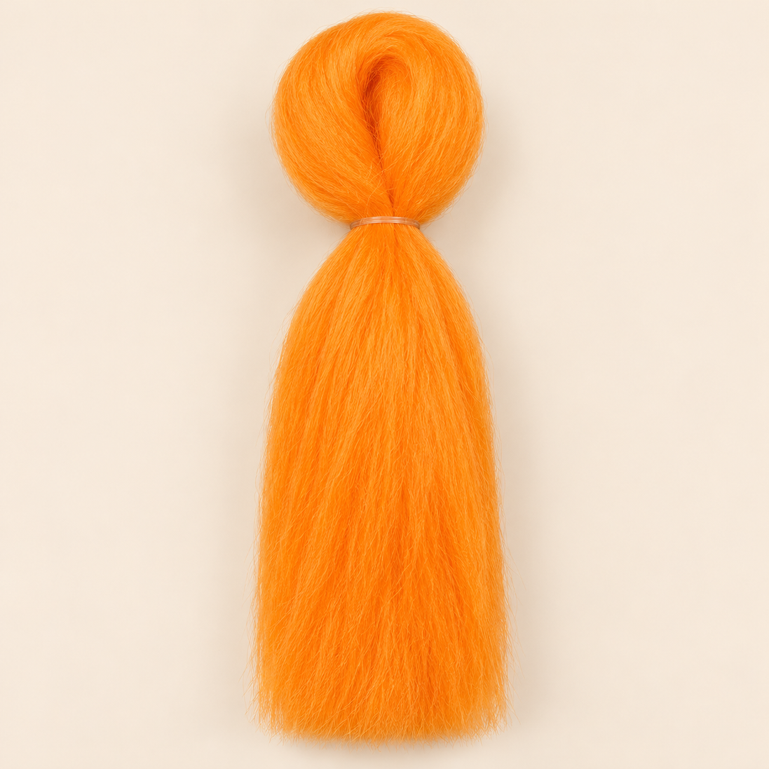 Jumbo Braid BraidOrDie 60 cm – Light Orange lichtoranje op beige achtergrond