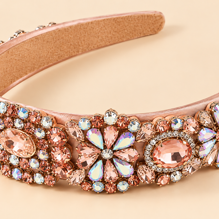 Luxe roségouden haarband met sierstenen en strass