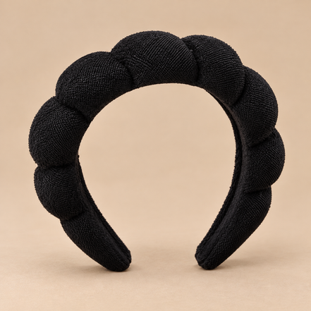 Zwarte zachte gewatteerde make-up haarband
