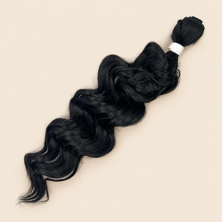 Manasi synthetische weave 50 cm – 100 gram – 1B op beige achtergrond