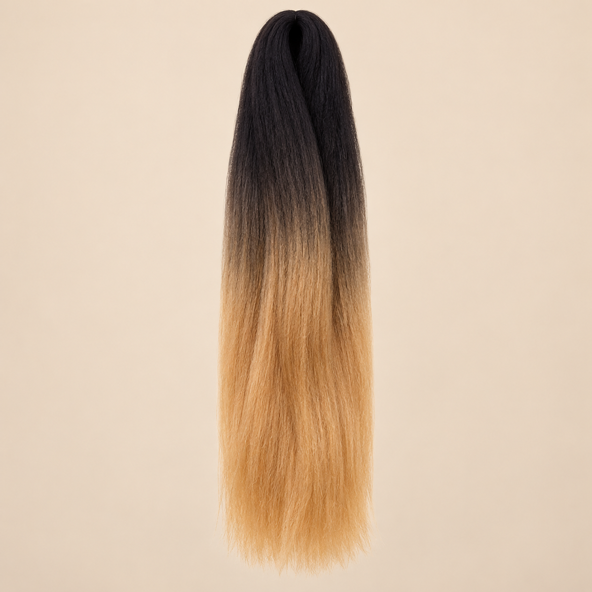 Ombre Jumbo Braid African Collection 60 cm – 1B/27 zwart-honingblond op beige achtergrond