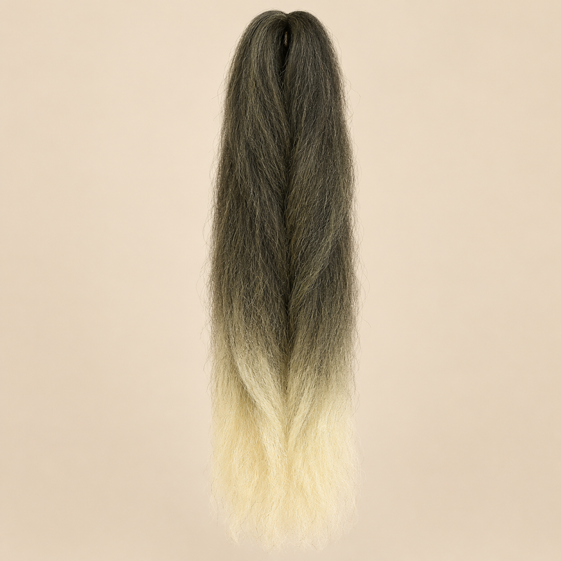 Ombre Jumbo Braid EVE 60 cm – T1B/613 zwart-lichtblond op beige achtergrond