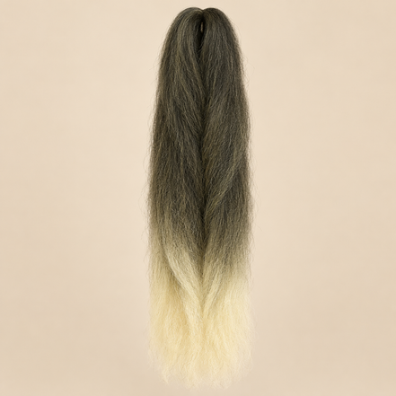 Ombre Jumbo Braid EVE 60 cm – T1B/613 zwart-lichtblond op beige achtergrond