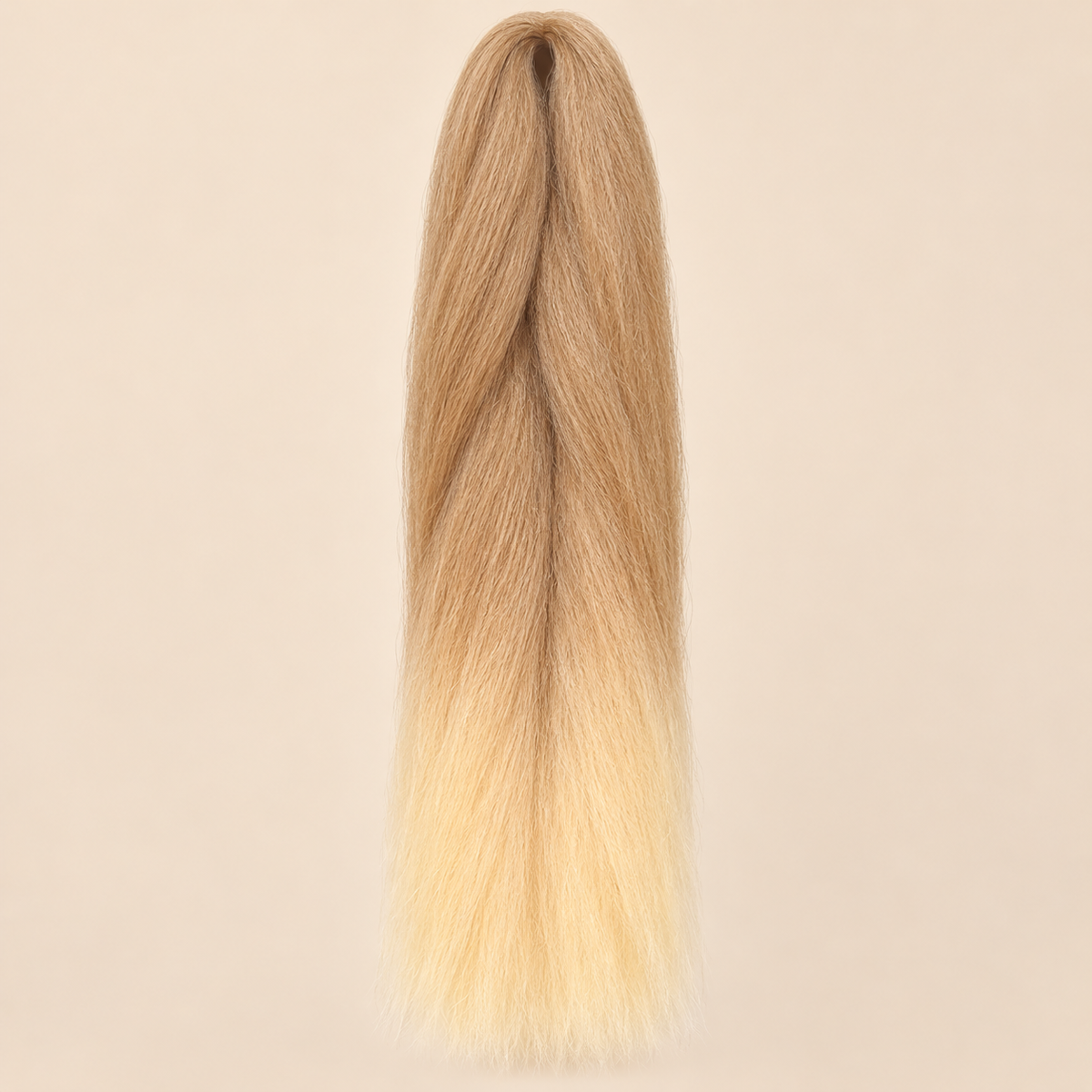 Ombre Jumbo Braid RastAfri 60 cm – BT27/613 honingblond-lichtblond op beige achtergrond