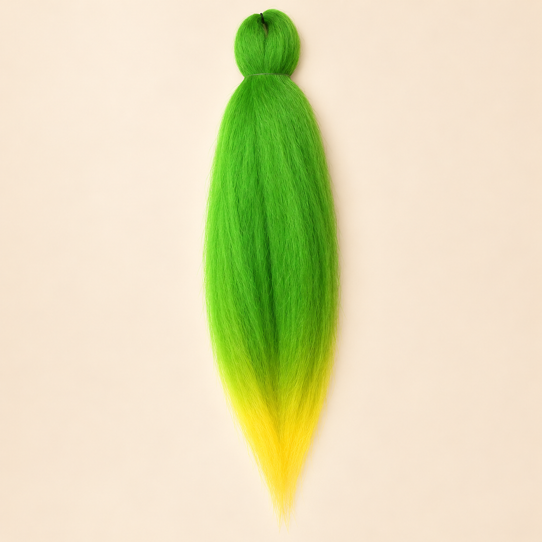Jumbo Braid Pre-Stretched EVE 70 cm – OM/Green.Yellow groen-geel op beige achtergrond