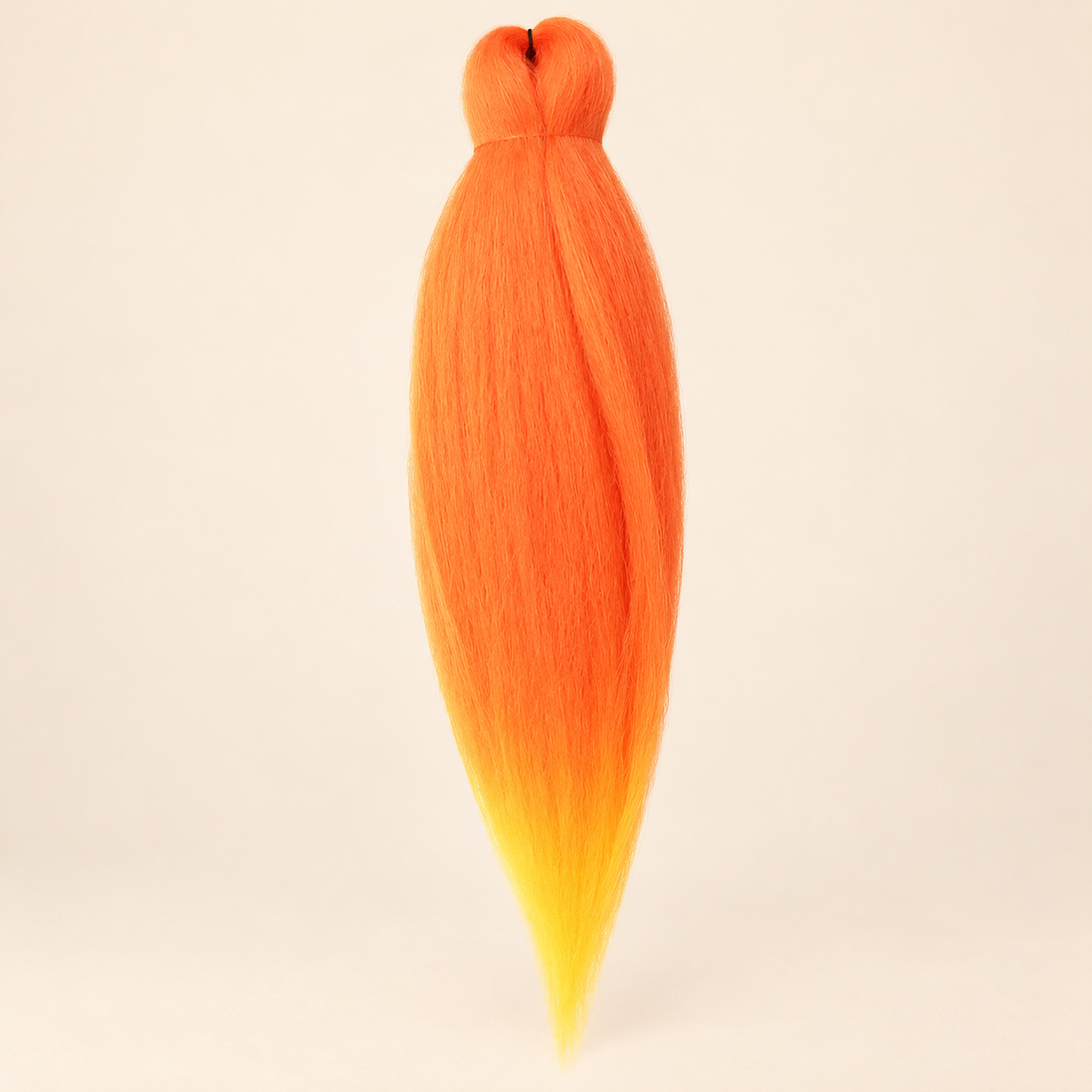 Jumbo Braid Pre-Stretched EVE 70 cm – OM/Orange.Yellow oranje-geel op beige achtergrond