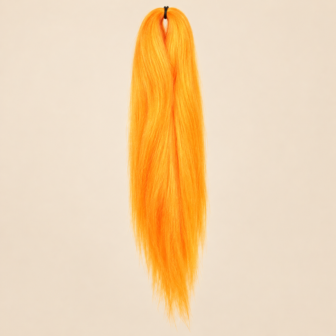 Jumbo Braid Pre-Stretched RastAfri 65 cm – SunKiss zongeel-oranje op beige achtergrond