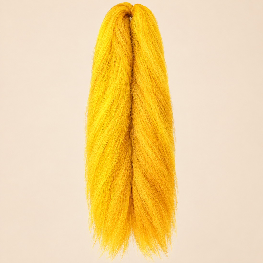 Jumbo Braid 100% RastAfri 60 cm – Goldie goudgeel op beige achtergrond