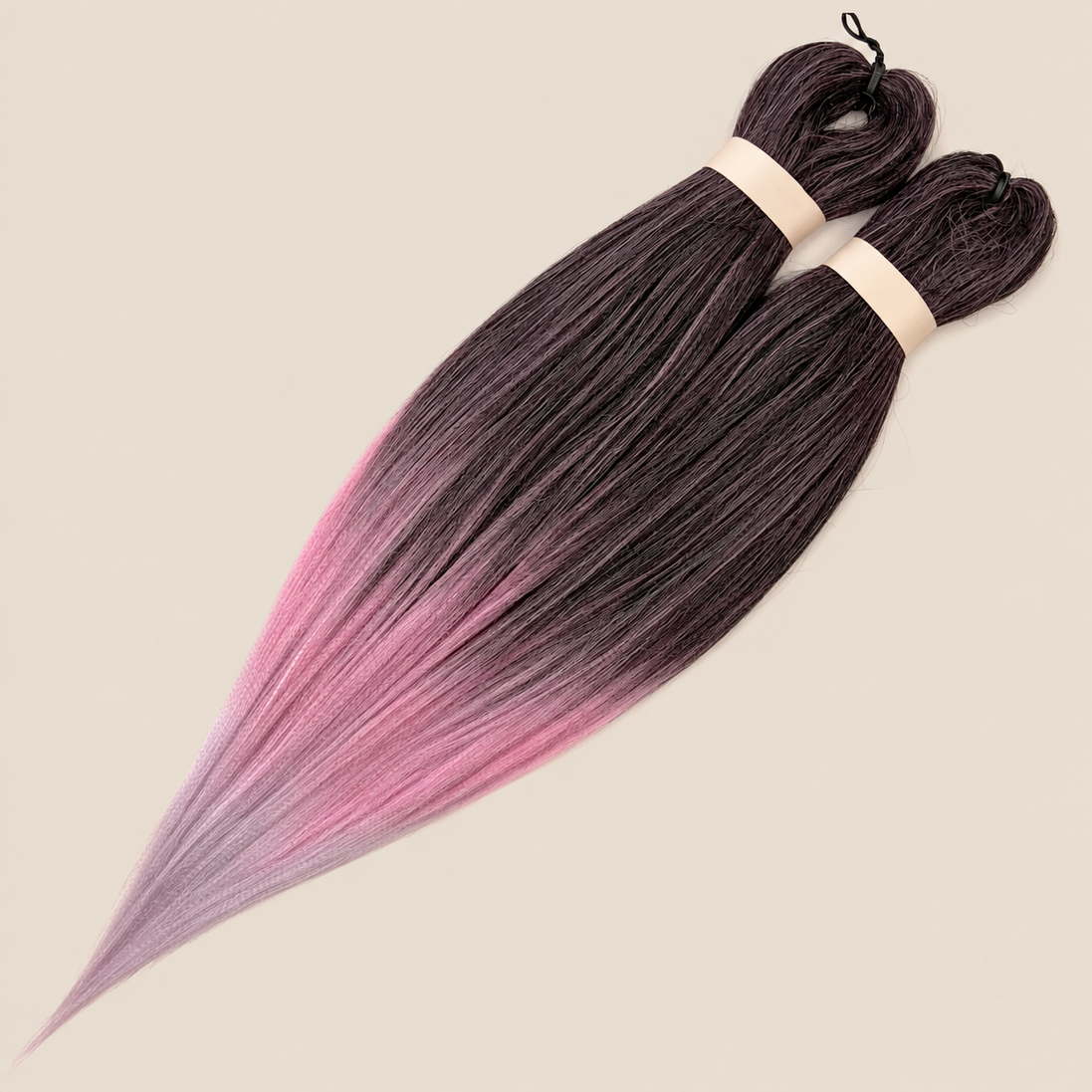 Ultra Braid 2-in-1 pre-stretched OM/Rose Lilac Zwart roze lila ombre, 60 cm 160 gram op beige achtergrond