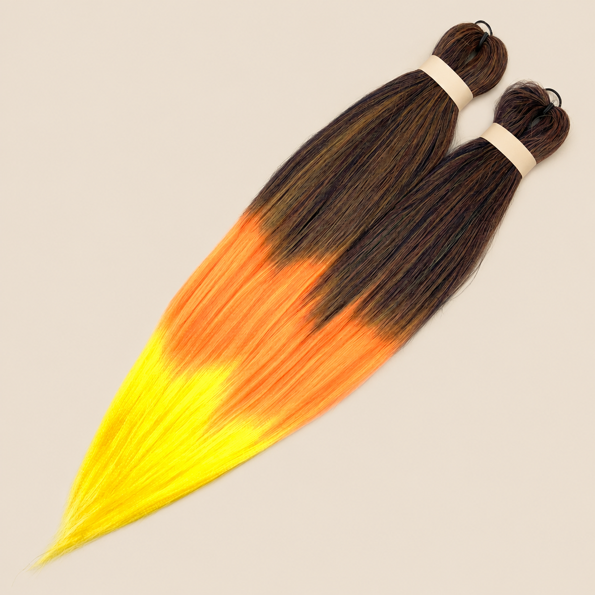 Ultra Braid pre-stretched T3/OM/Sunset donkerbruin oranje geel ombre 60 cm, 160 gram op beige achtergrond
