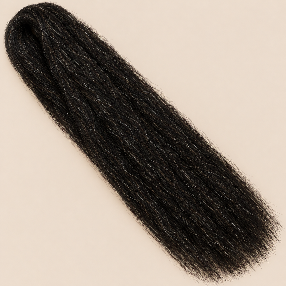 Ultra Braid kanekalon 1B natuurlijk zwart 100 cm, 165 gram op beige achtergrond