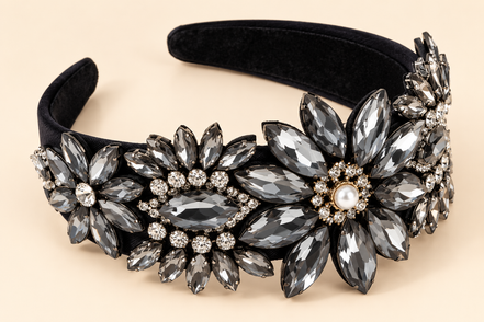 Luxe zwarte haarband met grijze sierstenen en bloemen